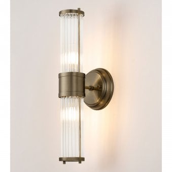 Tansley E14 IP44 Up & Down Wall Light in Antique Brass with Clear Glass Rods